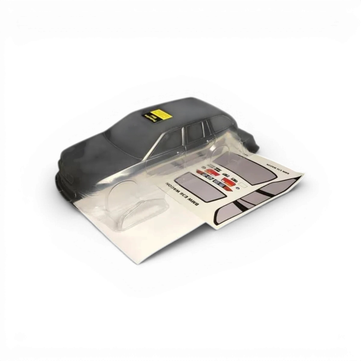 Carrosserie de voiture BMW E36 Touring pour RC, fabriquée par Aplastics RC, vue de côté avec détails de la carrosserie.