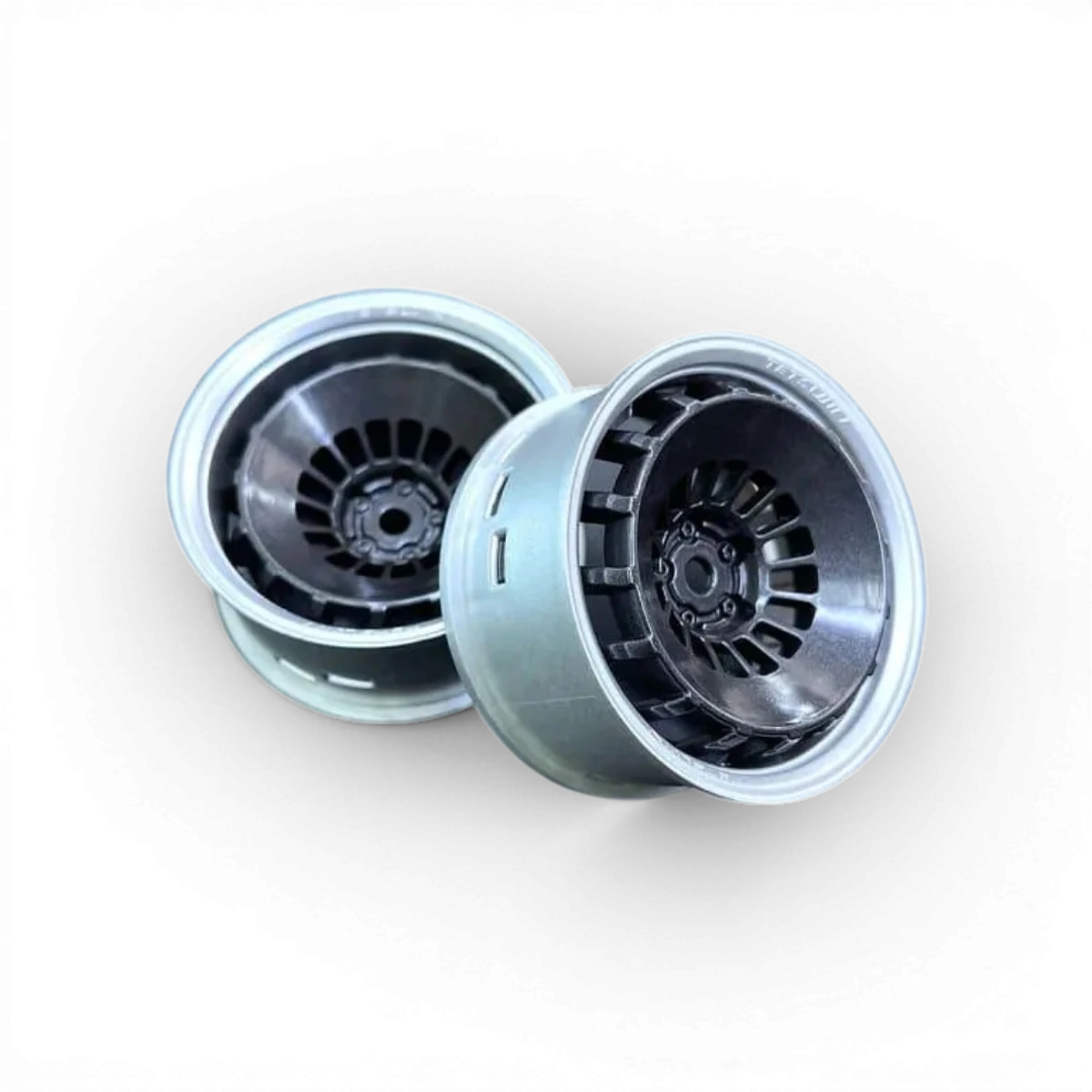Roues de bowling gris et noir Tetsujin dans un ensemble, avec design moderne et détails visibles.