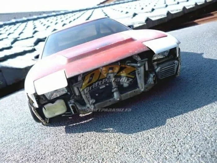 Carrosserie avant sans pare-chocs pour 180SX Yokomo, marque D-magic JP, vue de face, en plastique noir.