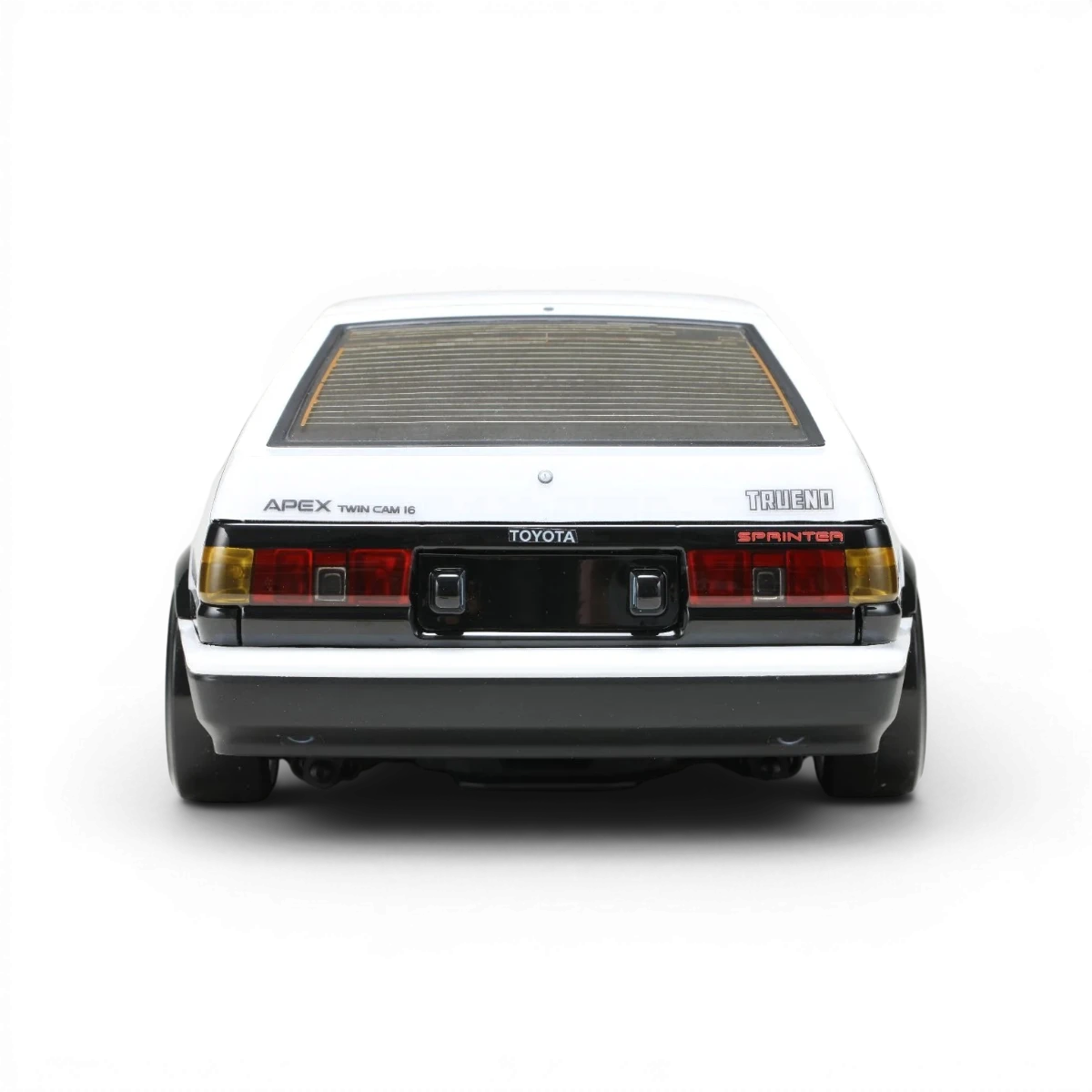 Carrosserie Toyota AE86 Trueno T3 pour voiture RC, fabriquée par Team Yokomo, en plastique blanc avec détails précis.