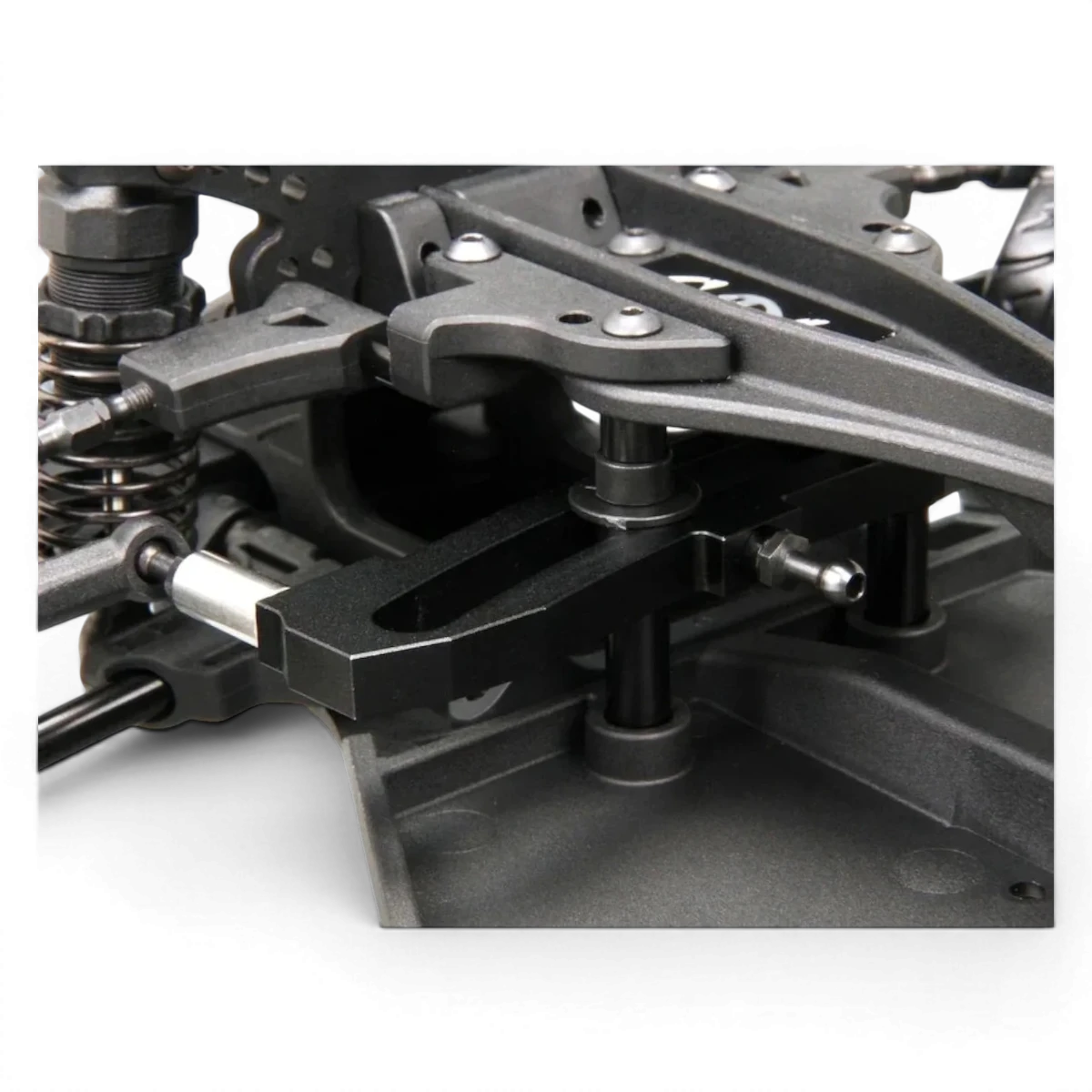 Châssis RC Drift GRK GS2 Modifié de la marque SHIBATA, vue en gros plan, avec détails du châssis pour voiture télécommandée.