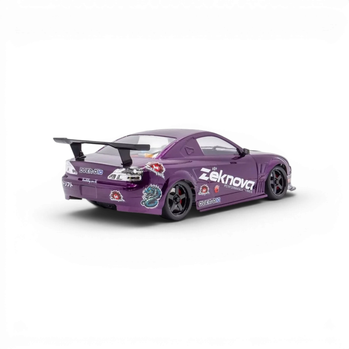 Châssis RC drift HOBBYTECH OVER-D10 RTR Brushless RWD, vue de face avec composants visibles, prêt à conduire.