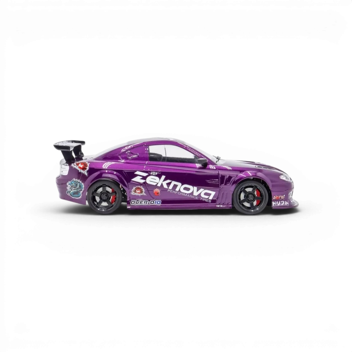 Châssis RC drift HOBBYTECH OVER-D10 RTR Brushless RWD, vue de face montrant le châssis de voiture télécommandée.