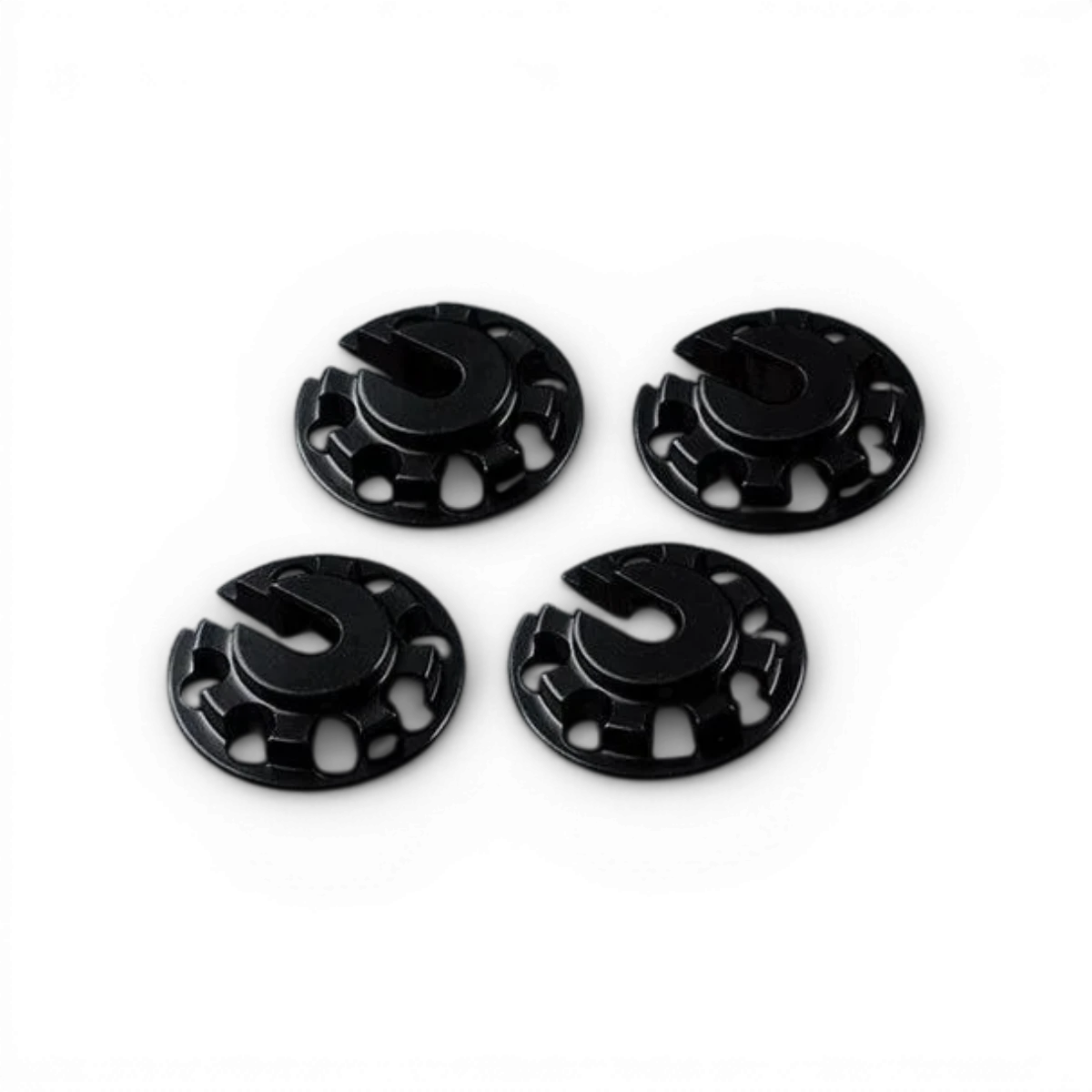 Coupelles amortisseur noires de Max Speed Technology, pièces détachées pour suspension, visibles en gros plan.