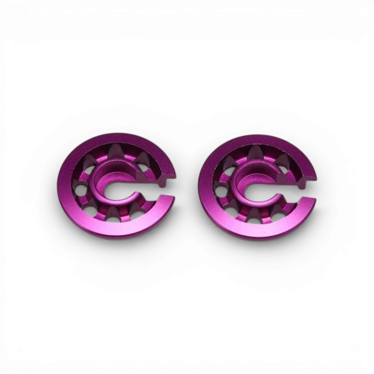 Coupelles ressorts avant Bigbore Violettes pour voiture RC, pièce détachée Team Yokomo, visible en détail dans l'image.