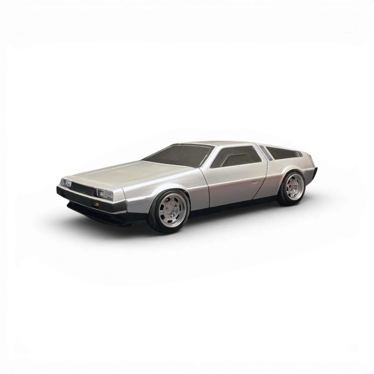 Carrosserie DMC Delorean en plastique pour voiture RC Aplastics RC, finition détaillée et design emblématique.