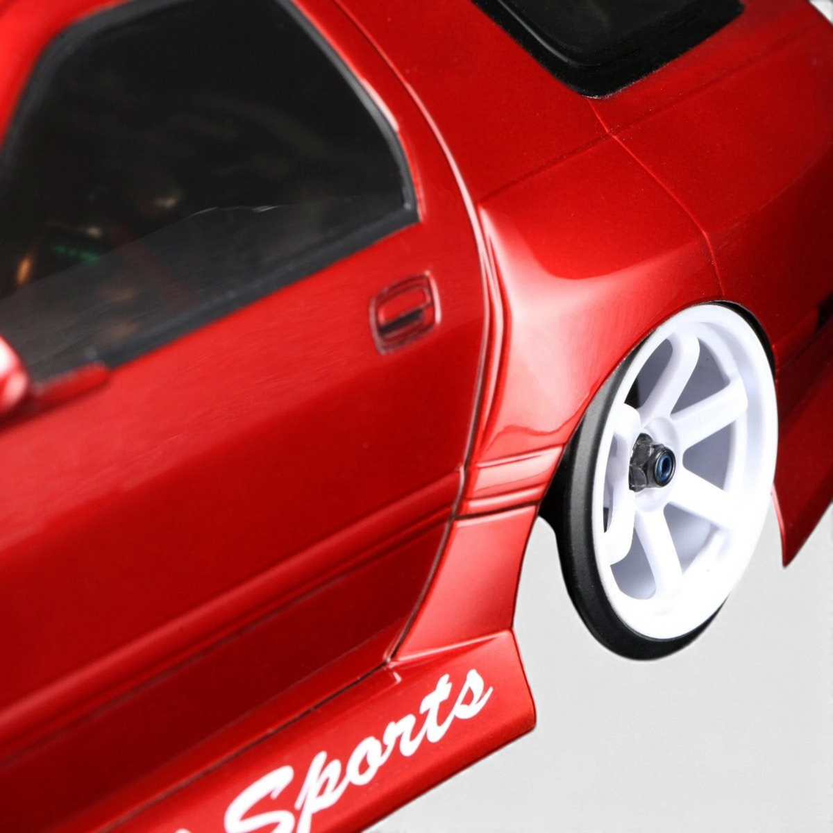 Kit RC Drift RD2.0 avec Mazda RX-7 FC3S BN Sports et roues, fabriqué par Team Yokomo, vue de l'ensemble du modèle.