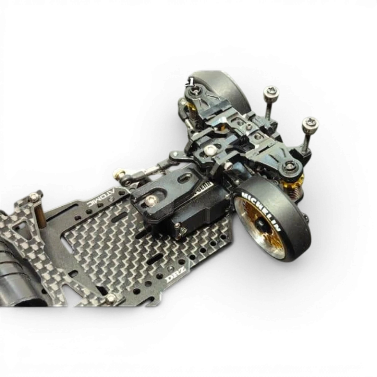 Kit châssis drift RWD DRZV3 de Atomic RC Mini pour voitures RC, vue détaillée du châssis en action.