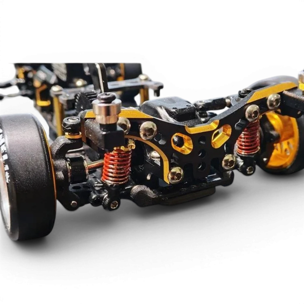 Kit châssis drift RC DRZV3MS RWD de Atomic RC Mini, vue en gros plan sur le châssis pour voitures radiocommandées.