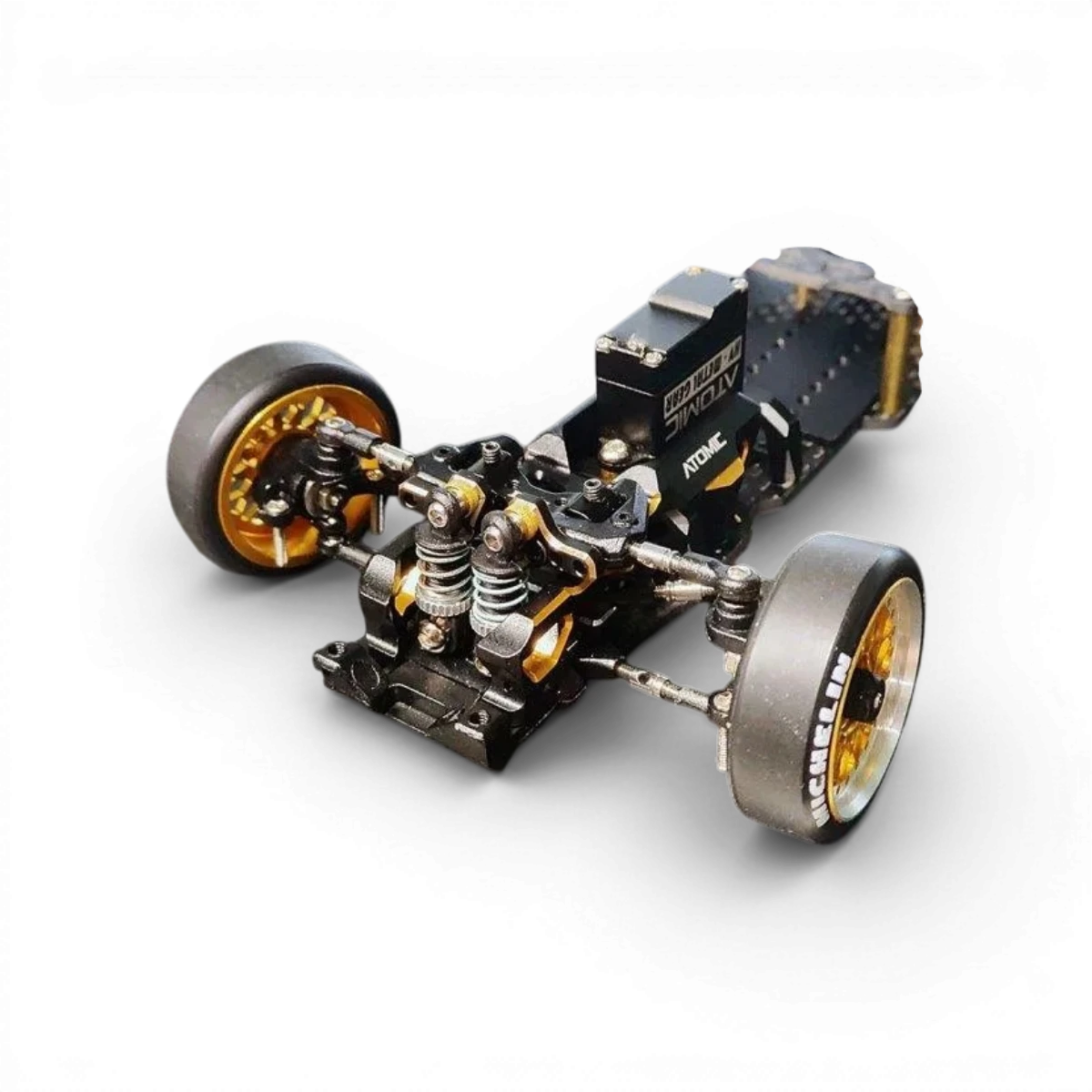 Châssis de drift RC DRZV3MS RWD de la marque Atomic RC Mini, vue en gros plan sur le kit de carrosserie pour voiture télécommandée