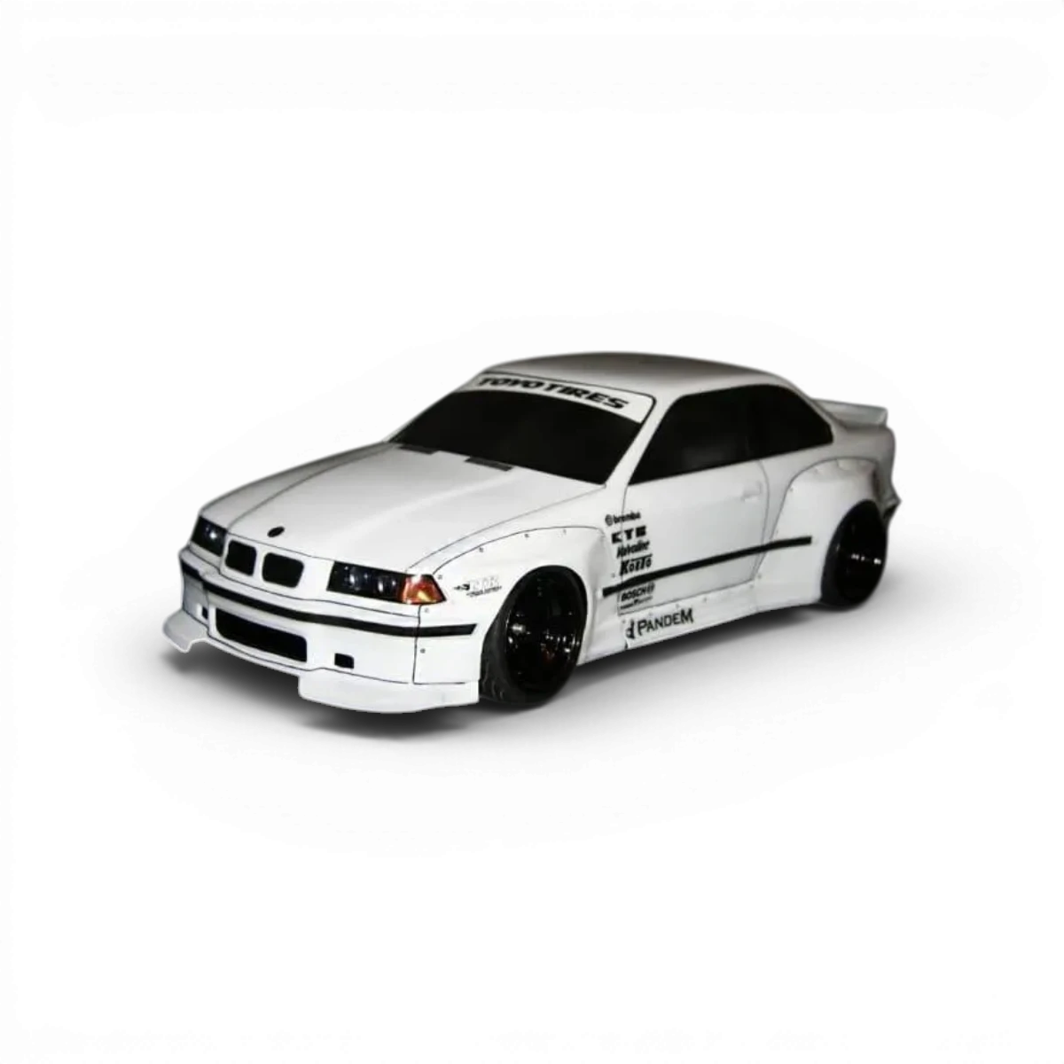 Kit de carrosserie large E36 pour RC, fabriqué par Aplastics RC, avec détails visibles du kit large pour voiture télécommandée.