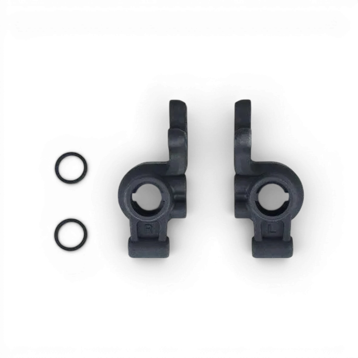 Fusées arrière RDX de Team Reve D, pièces de suspension pour véhicule, visibles en couleur noire avec composants métalliques.