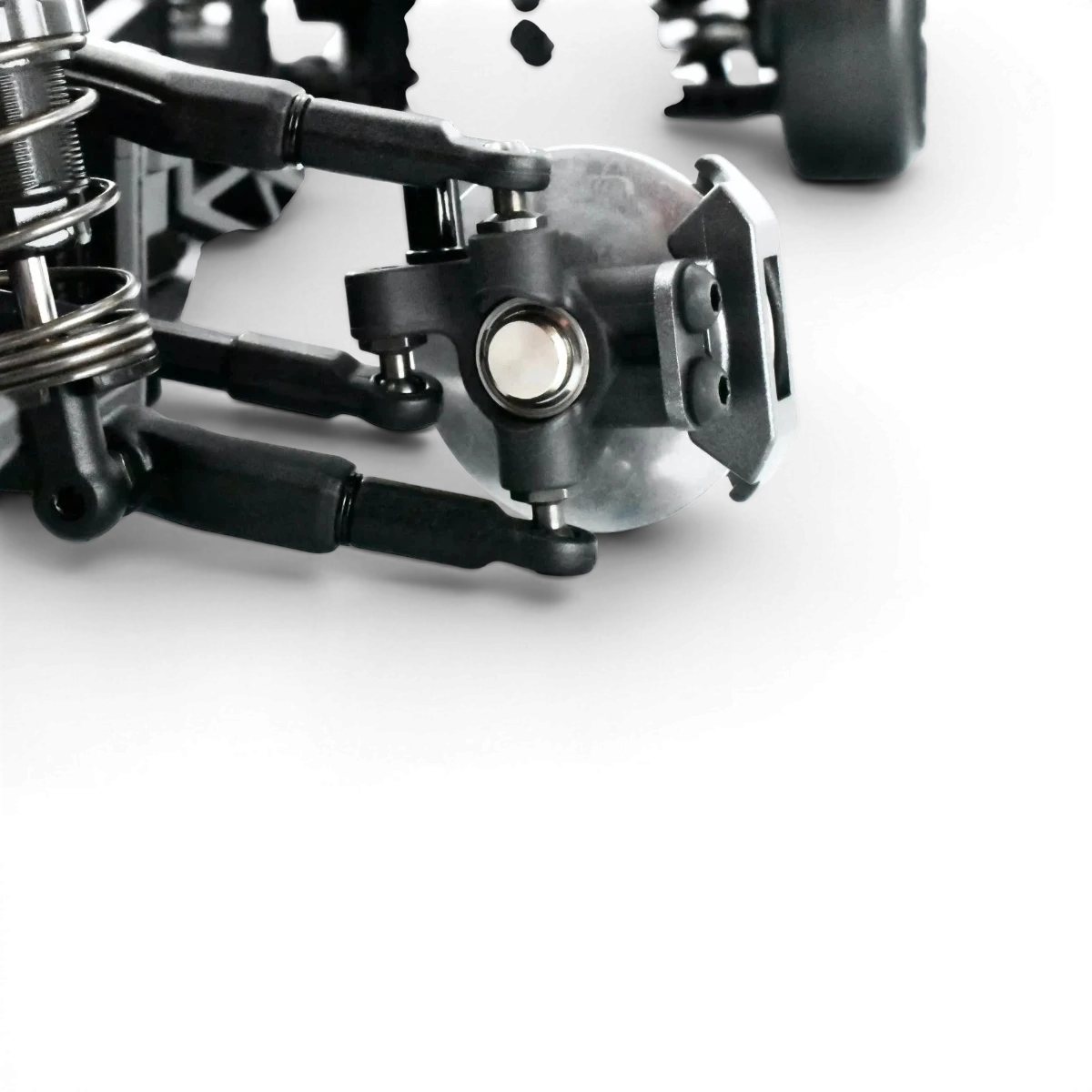 Fusées avant RDX en graphite pour voiture RC, fabriquées par Team Reve D, visibles avec détails en graphite.
