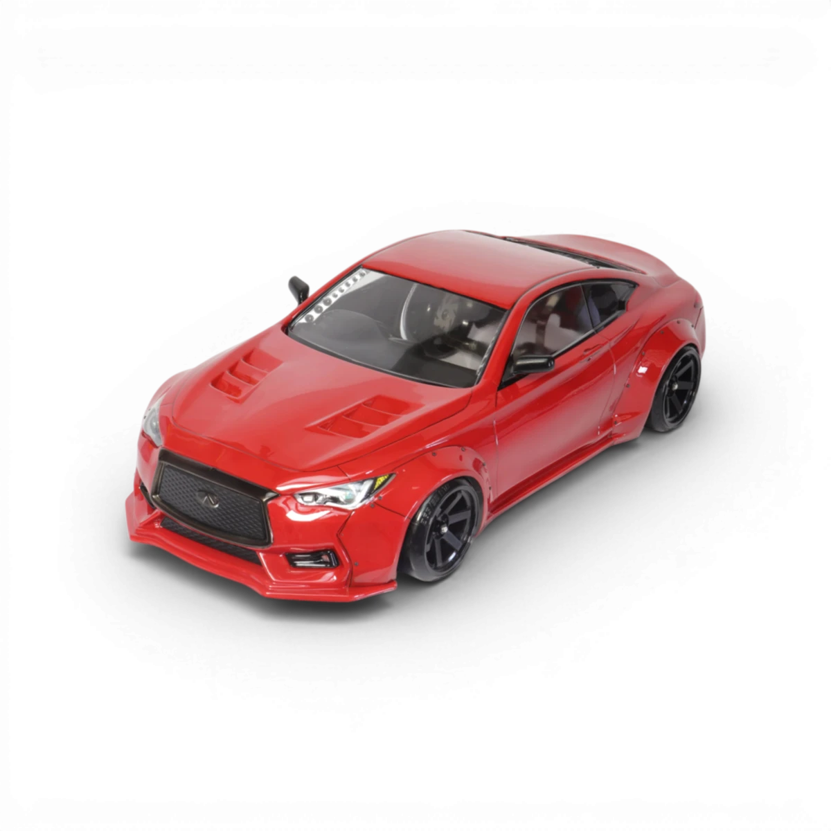 Carrosserie INFINITI Q60 D1GP de la marque SHIBATA, vue détaillée avec logo et finition élégante.