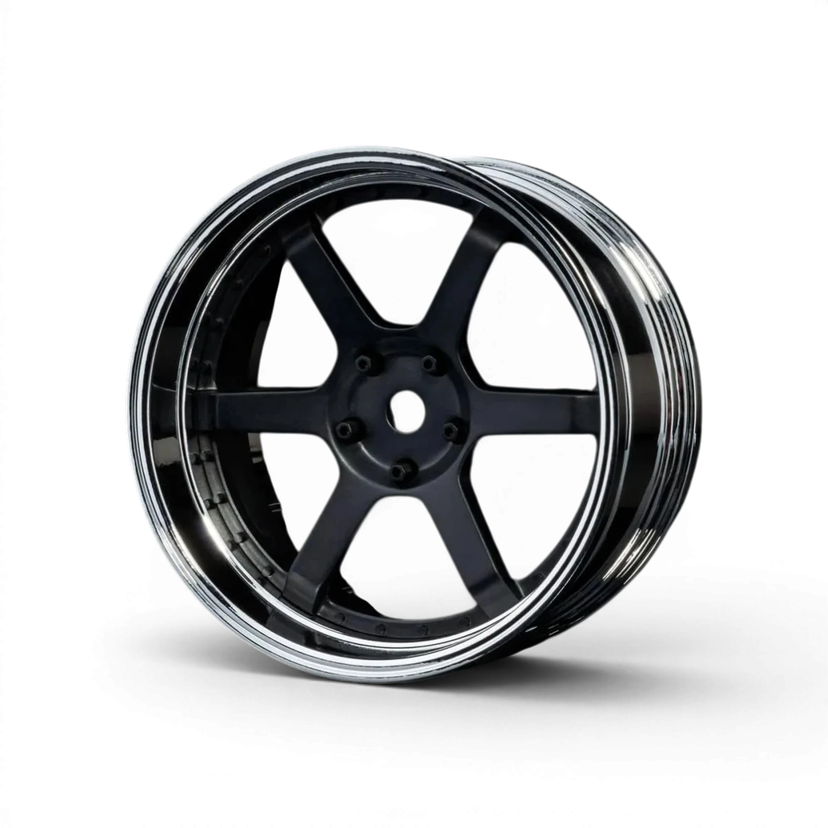 Jantes Max Speed Technology 106 avec offset réglable, finition chrome et noire mate, vue de face sur fond blanc.