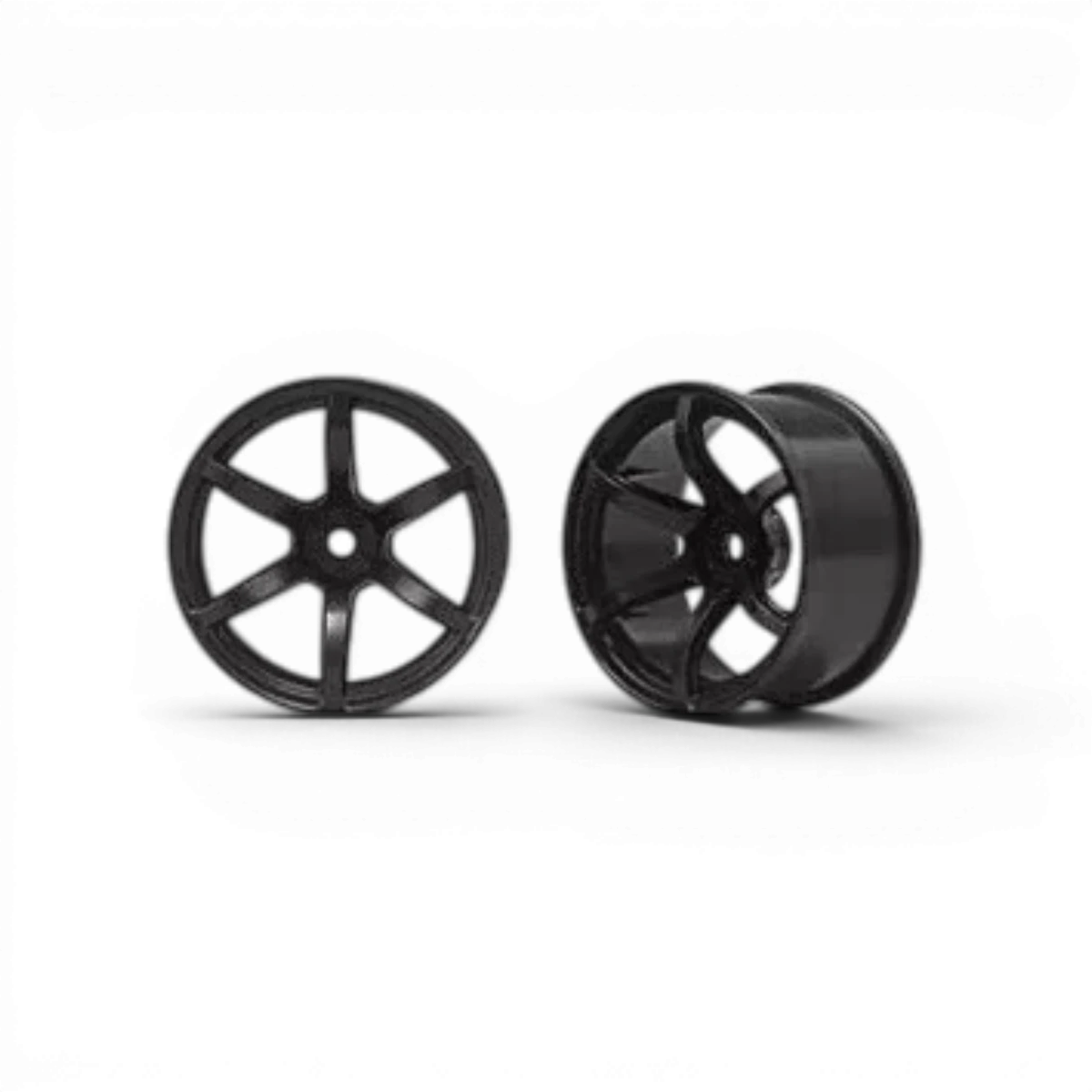 Jantes 6 branches Racing Performer Offset 6 noires pour voitures RC, fabriquées par Team Yokomo, visibles en gros plan.