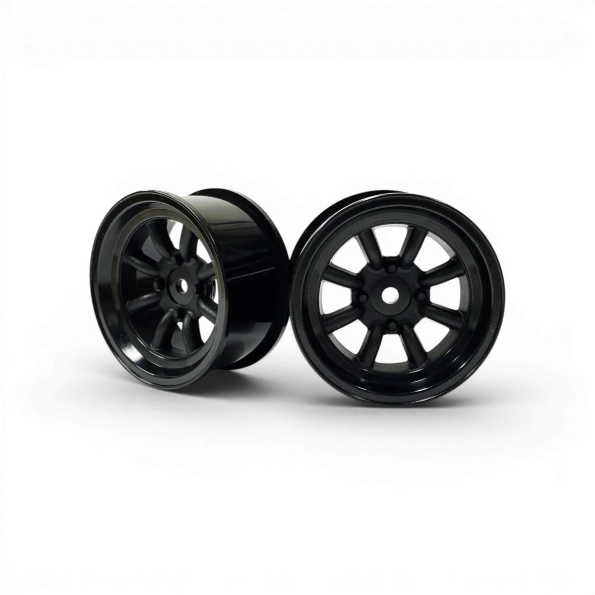 Jantes Watanabe noires avec décalage +5, roues de marque Topline, visibles en détail avec finition noire brillante.