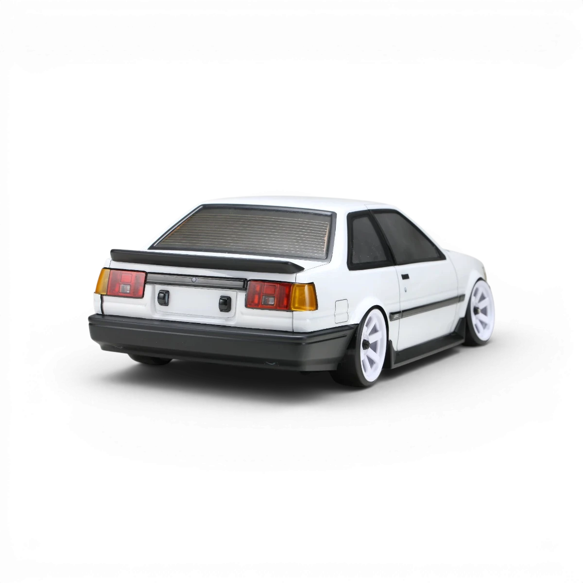 Kit de carrosserie aéro pour Toyota Corolla AE86 Levin 2 portes, marque Team Yokomo, visible sur la image.