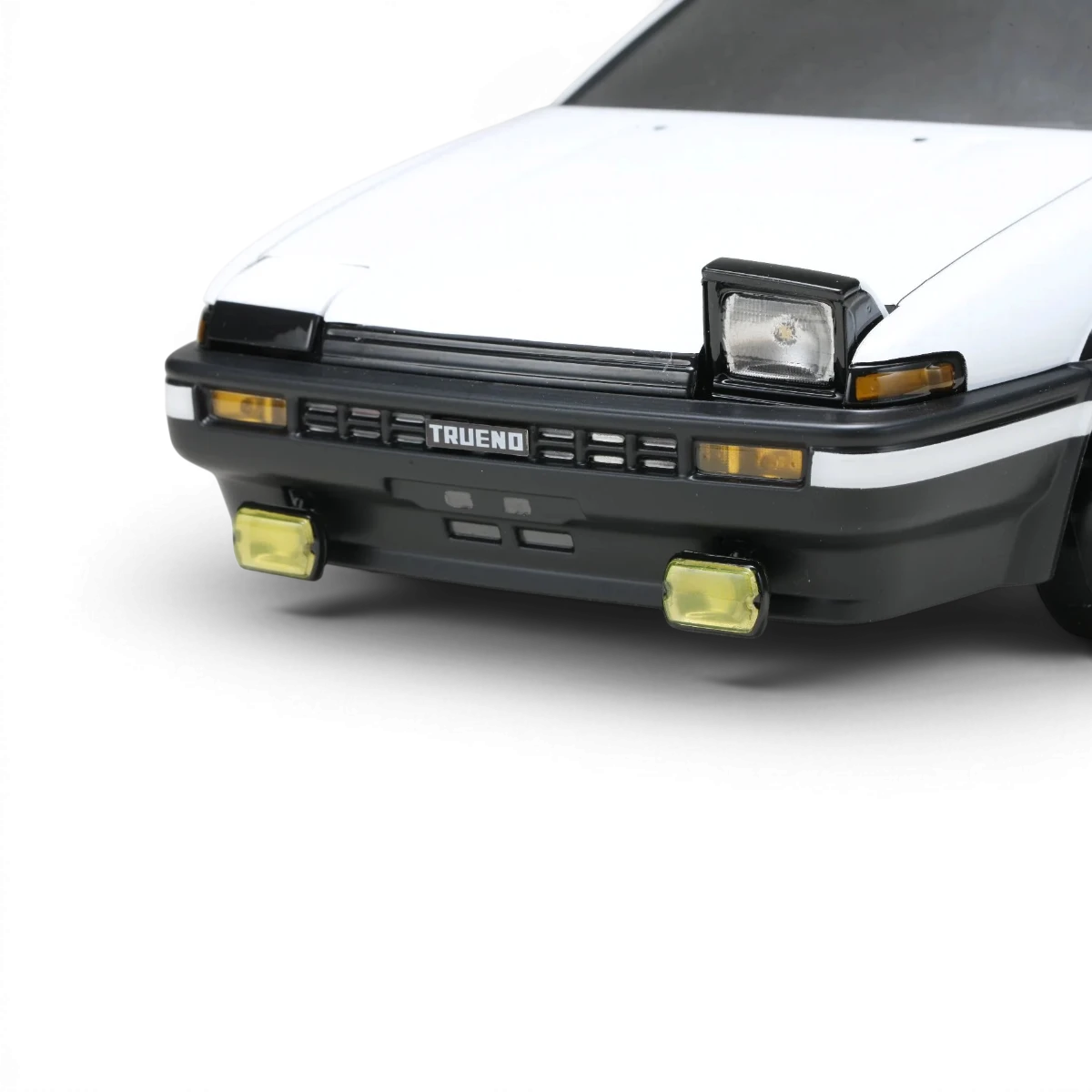 Kit de carrosserie aéro Toyota Sprinter AE86 Trueno 3 portes de Team Yokomo, vue détaillée du kit pour modèle réduit.