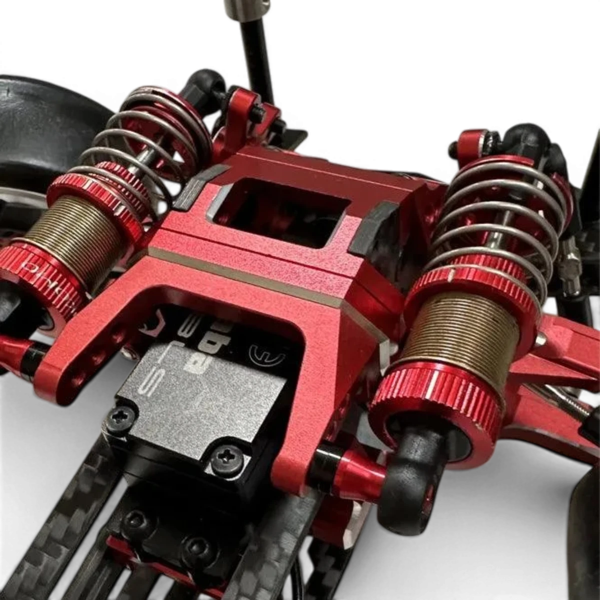 Kit Hydra Shark IFS RhinoRacing avec composants en plastique noir et tuyaux hydrauliques pour suspension avant de moto.