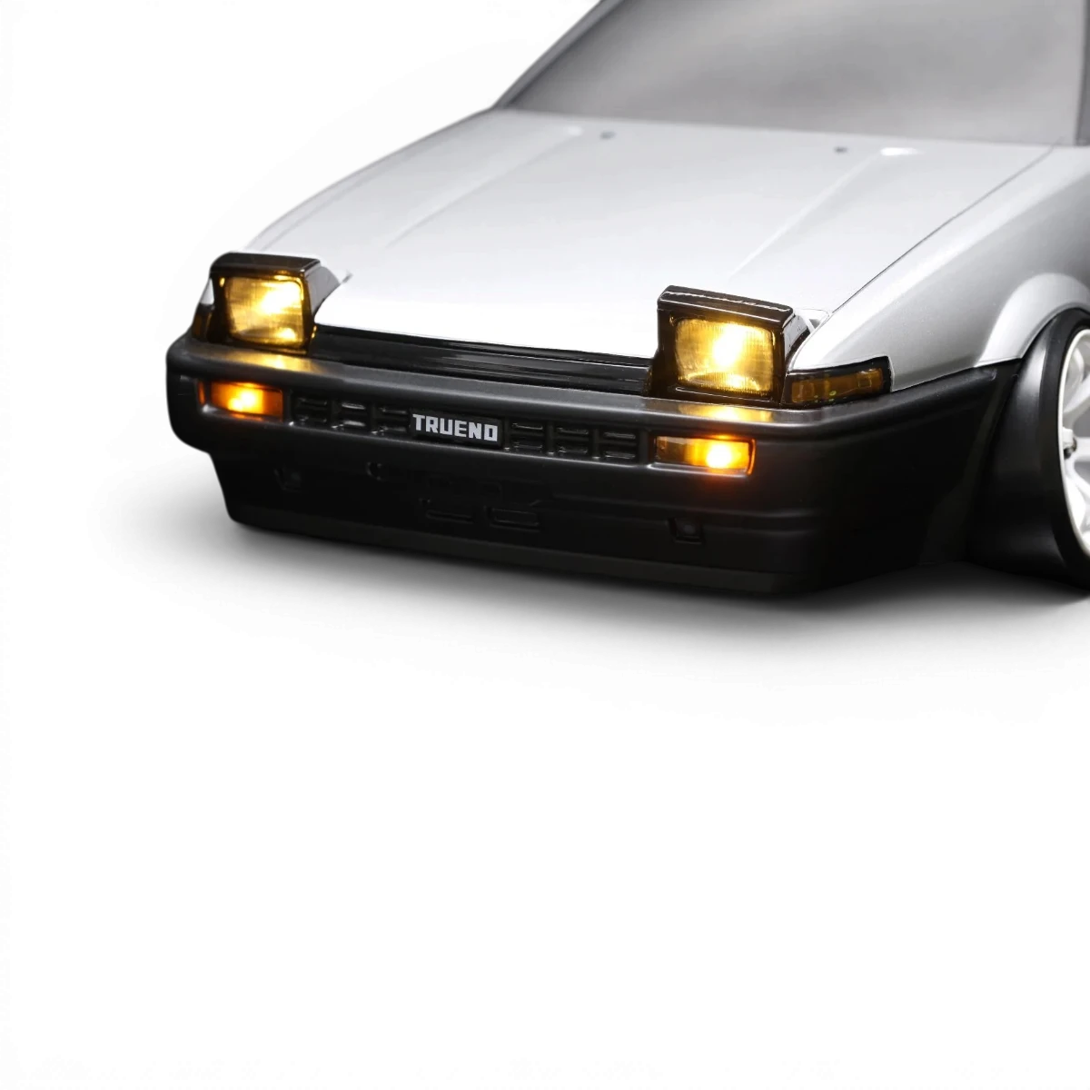 Kit LED pour Toyota AE86 Trueno 2 portes, accessoire de customisation de la marque Team Yokomo, avec composants lumineux visibles.