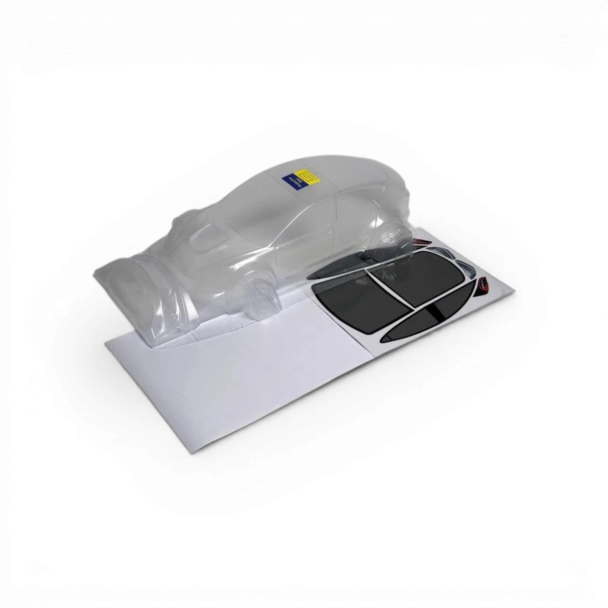 Voiture RC Model 3 de Aplastics RC avec carrosserie détaillée et design réaliste.