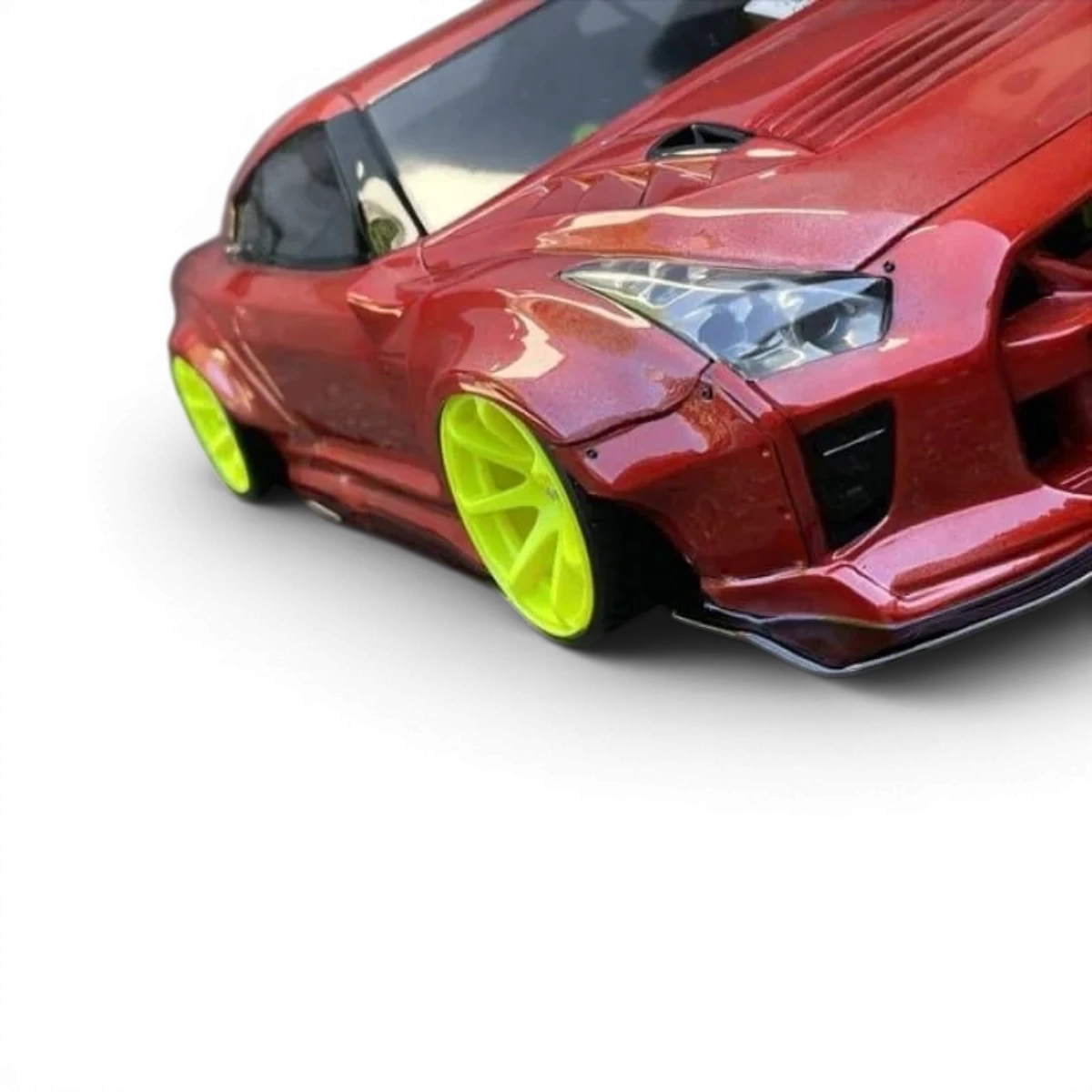 Modèle de carrosserie Nissan GTR R35 BLS de Pandora RC, vue détaillée en plastique noir avec détails de design.