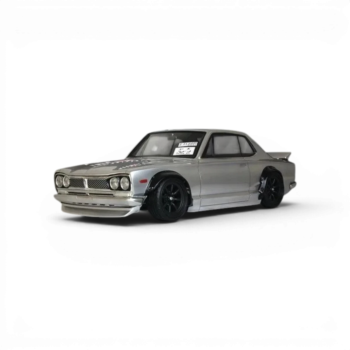 Modèle de voiture Nissan Skyline 2000GT-R KPGC10 en carrosserie réduit par Pandora RC, détail réaliste et finition précise.