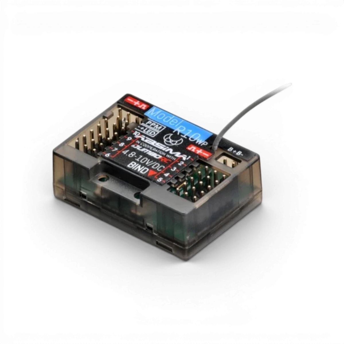 Radio 10 voies CR10P Absima 2,4 GHz avec récepteur électronique noir et boutons de contrôle visibles.