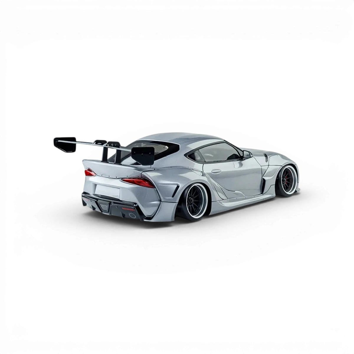 Voiture RC drift brushless Max Speed Technology RMX 2.5 RTR Toyota Supra A90 grise, vue de face avec détails du modèle.