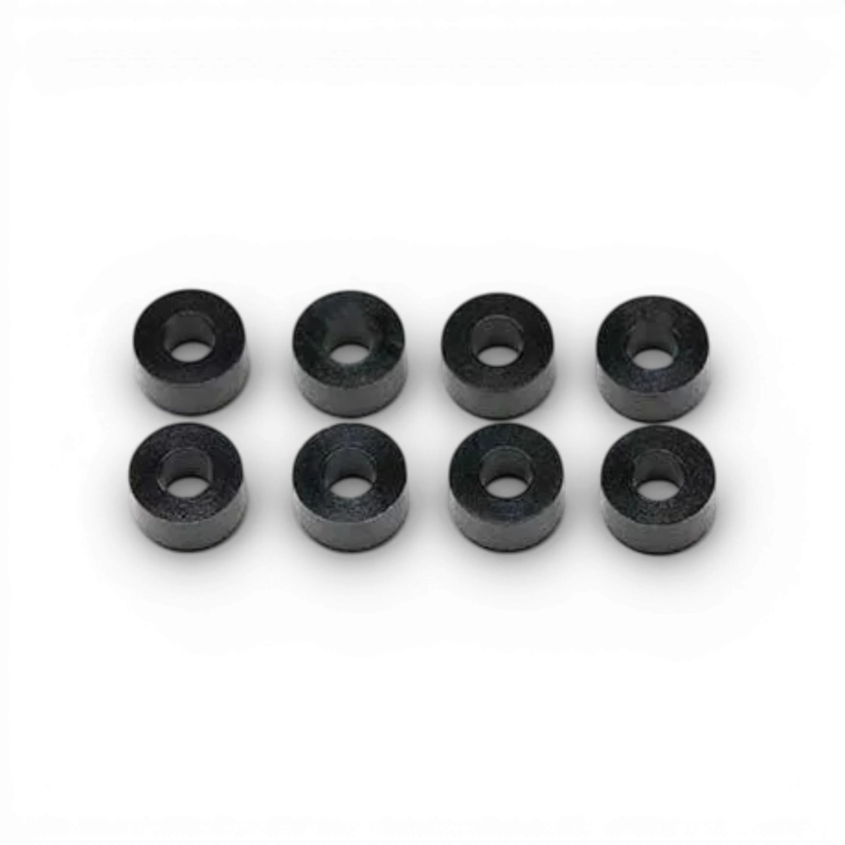 Rondelles noires 2,5x5x3 en pièces détachées pour modélisme, de la marque Team Yokomo, visibles en gros plan.