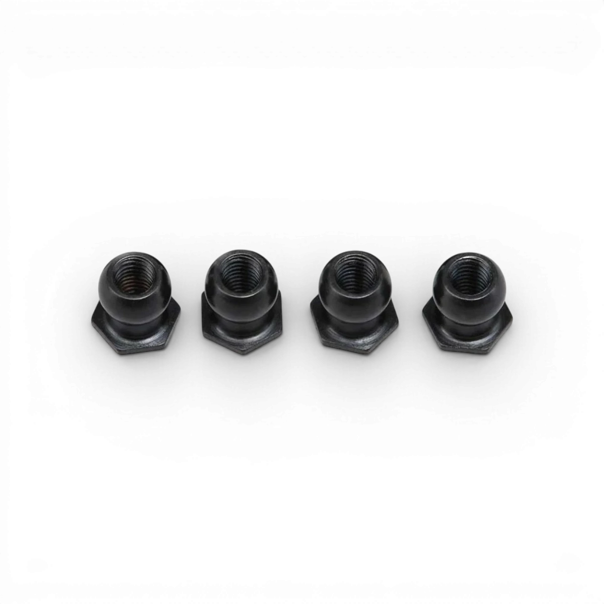 Rotules triangles MD 1.0 pour pièces détachées de voiture RC, fabriquées par Team Yokomo, visibles en gros plan.