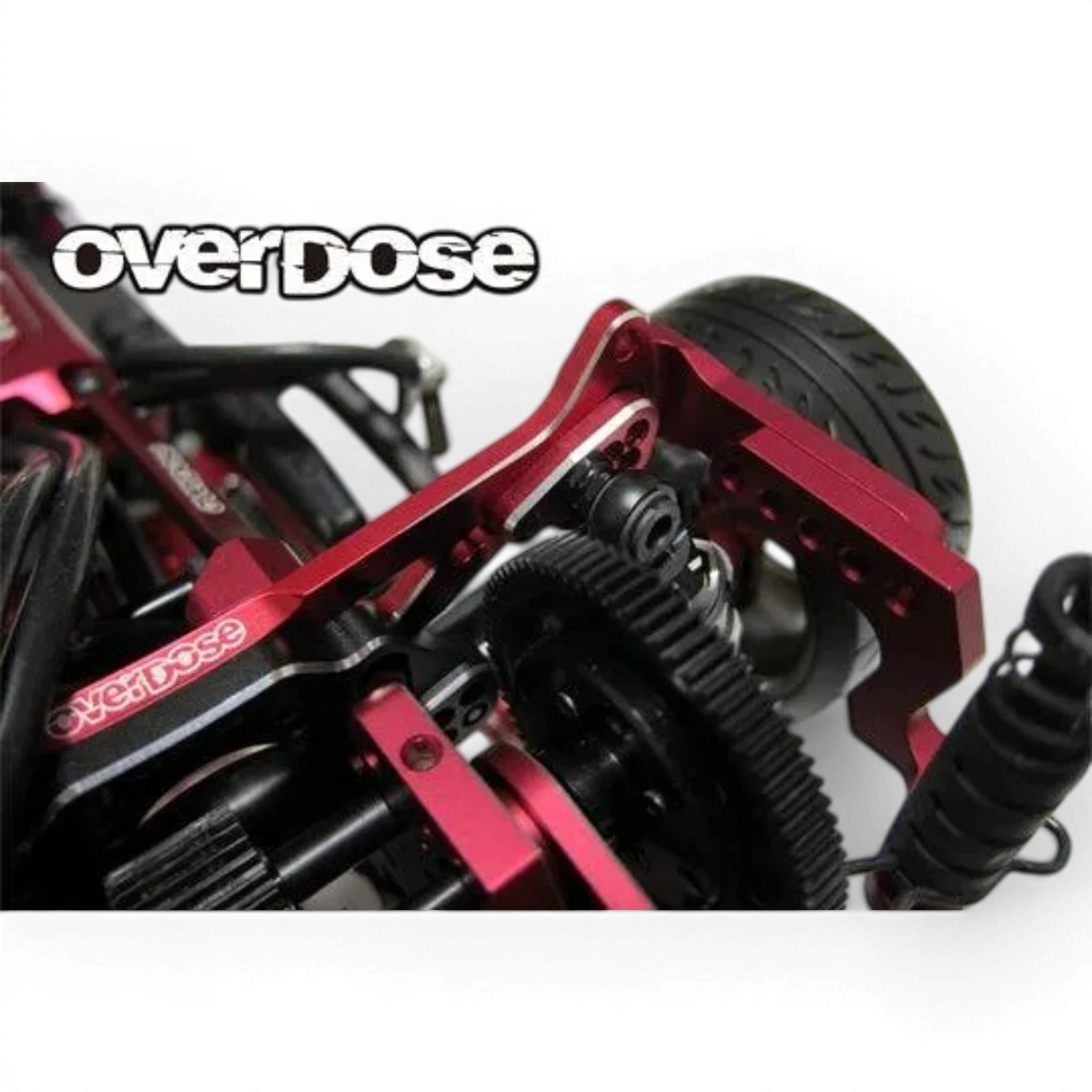 Pièces détachées Overdose, tour amortisseur ES en aluminium GALM, montre la pièce mécanique avec détails en aluminium.