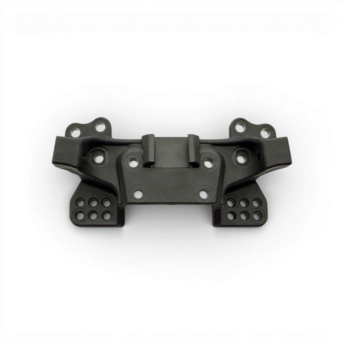 Tour d’amortisseur arrière en graphite pour voiture RC Drift, fabriquée par Team Reve D, visible sur l’image.