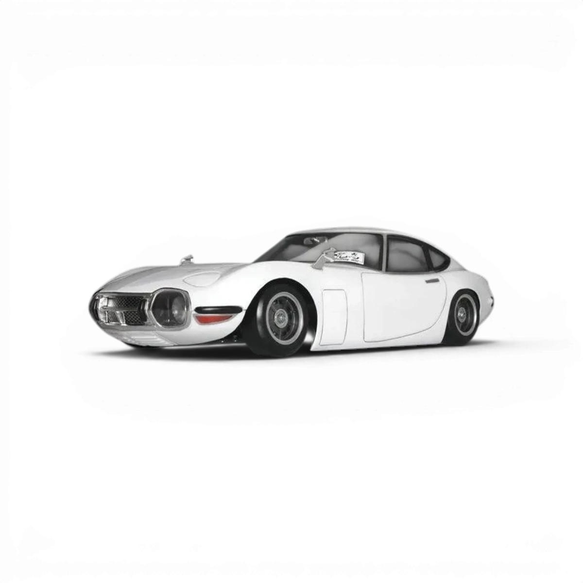 Modèle de carrosserie Toyota 2000GT de Pandora RC, reproduisant fidèlement le design classique de la voiture de collection.
