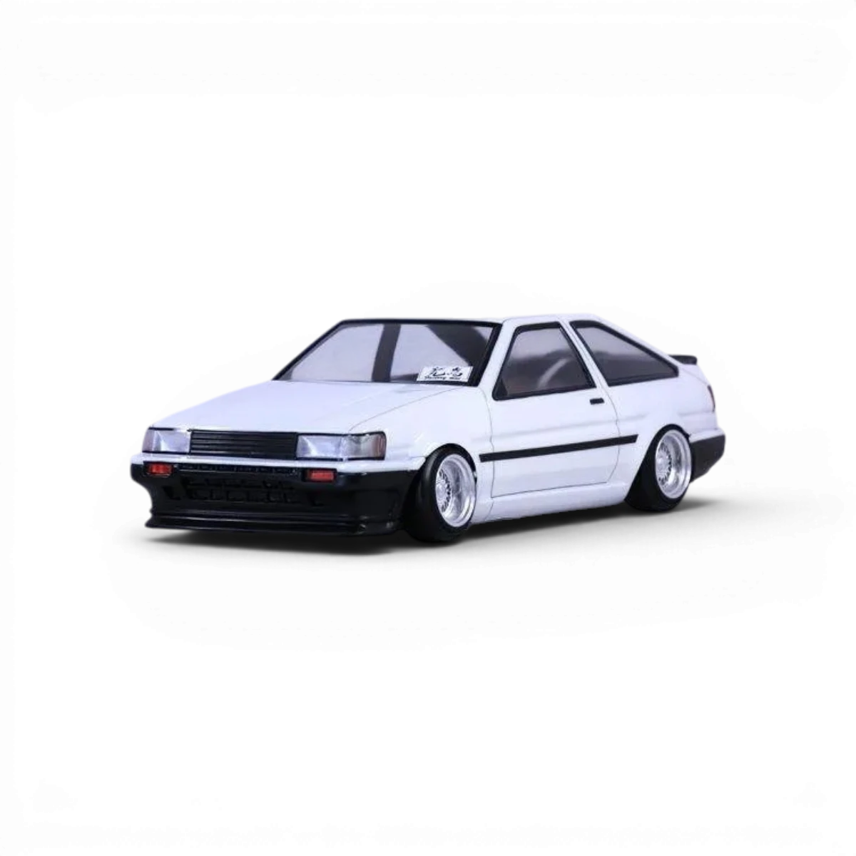 Voiture Toyota AE86 Levin 3 portes en carrosserie radiocommandée Pandora RC, vue de côté avec détails de la carrosserie.