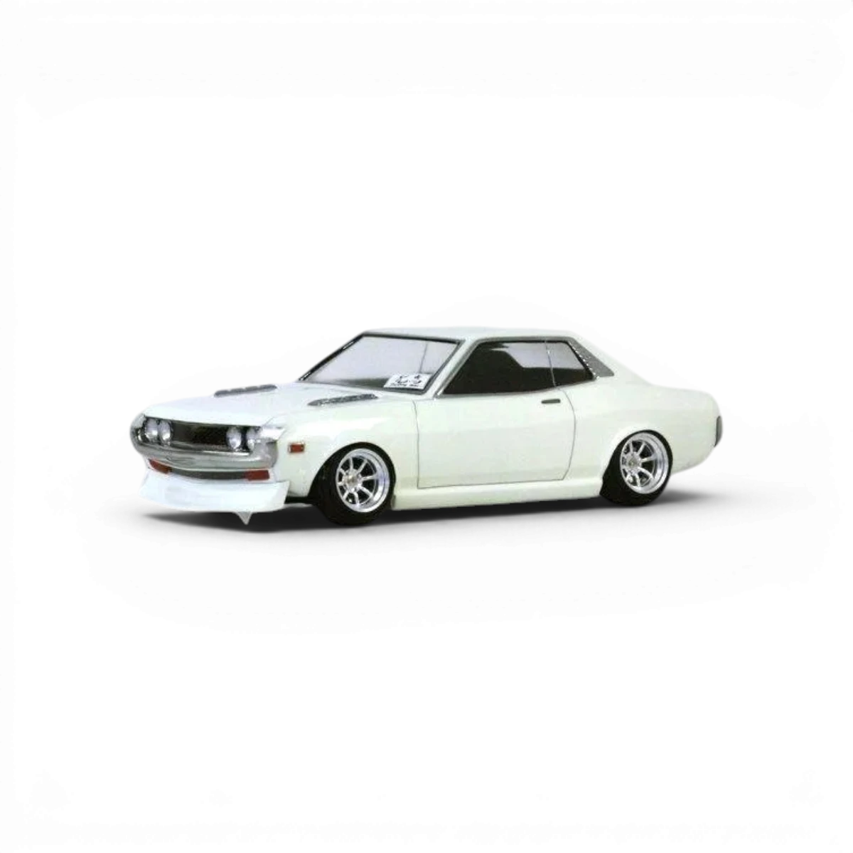Modèle de carrosserie Toyota Celica 1600GT Pandora RC, détail réaliste et design précis, vue de côté sur fond blanc.