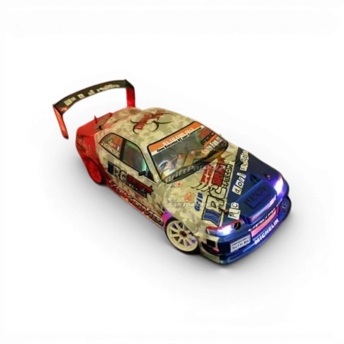 Carrosserie Toyota Chaser JZX100 version street, en plastique, de la marque Team Yokomo, vue de face sur fond blanc.