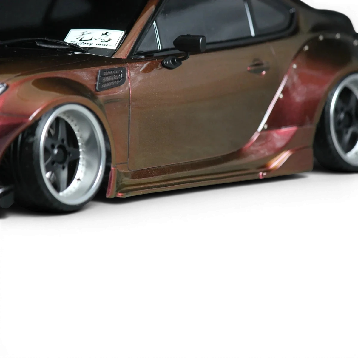 Carrosserie Toyota GR86 BLS BN-Sports de Pandora RC, peinture rouge avec détails noirs, vue de face sur un fond blanc