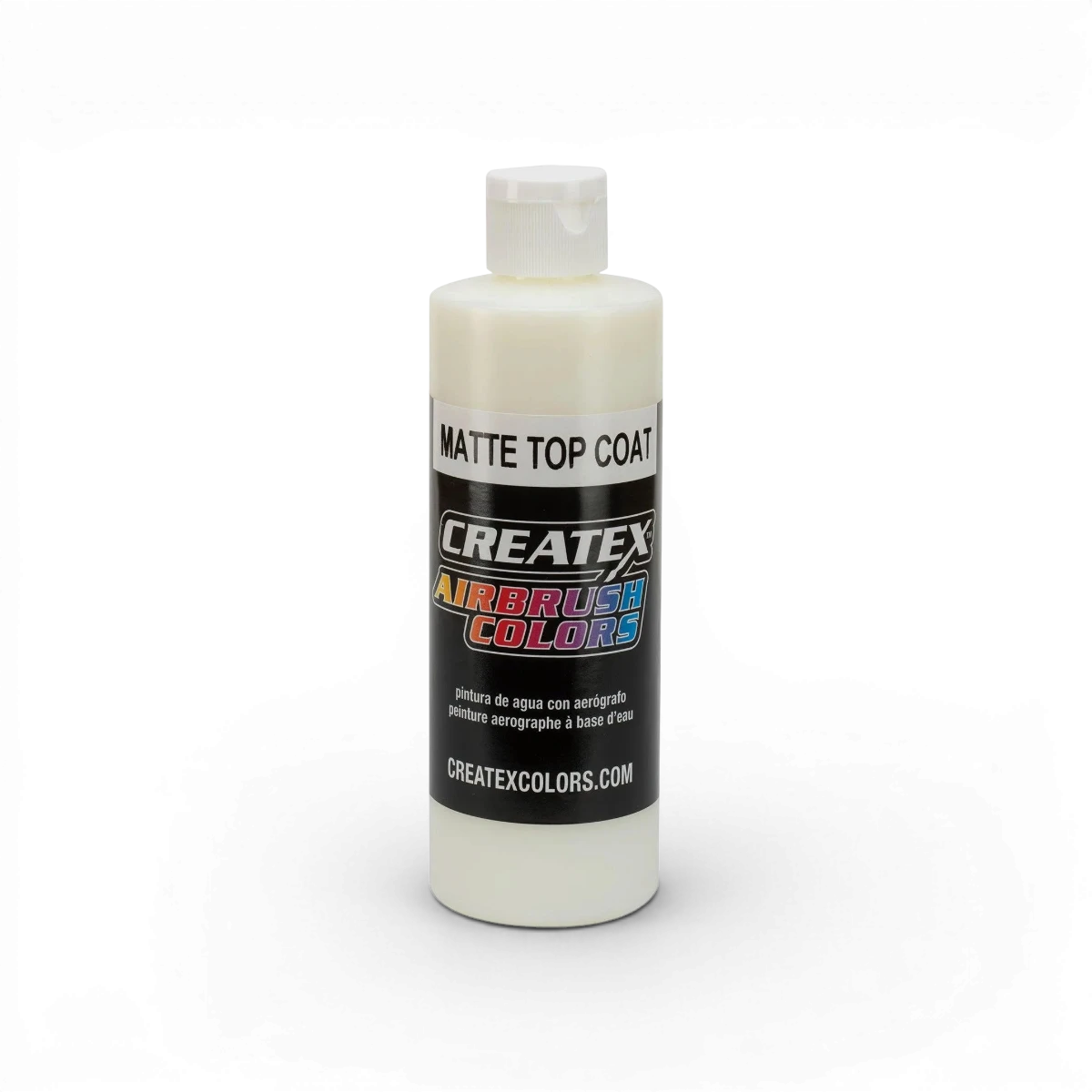 Vernis Mat Top Coat Createx Colors 5603 appliqué sur une bouteille de vernis pour finition matte.