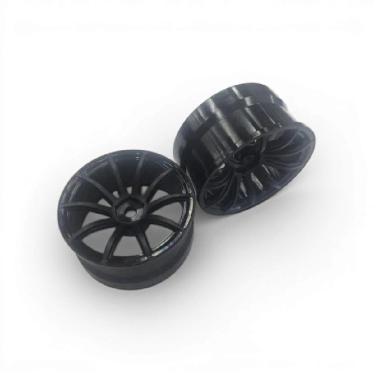 Roues modifiées SHIBATA 57 avec décalage +5 en noir, design sportif pour voitures, visible en gros plan sur fond neutre.