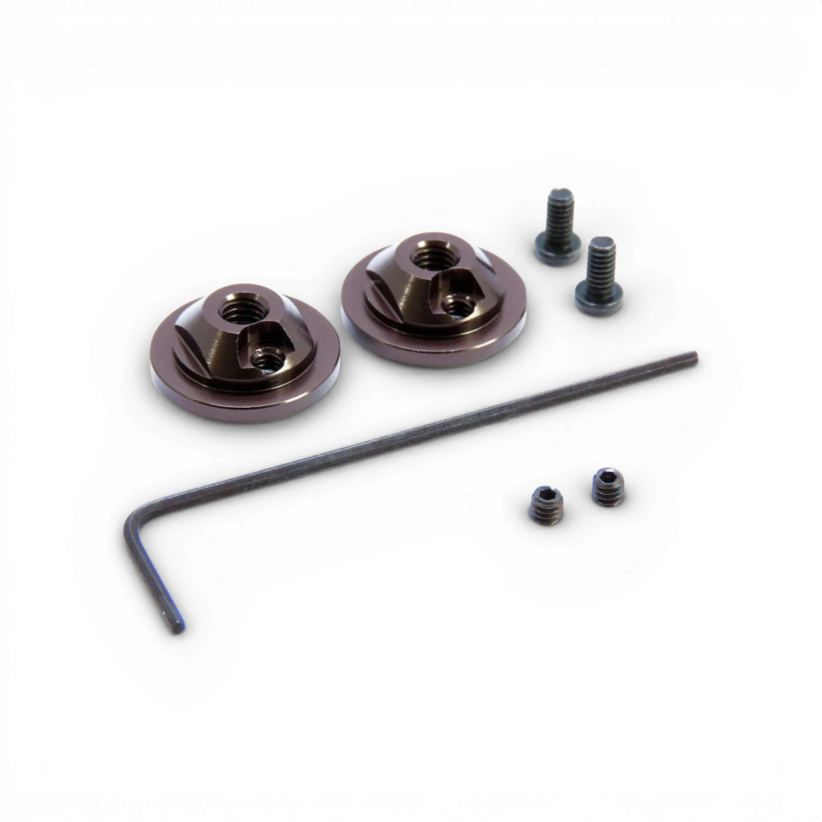 Bouchon ajustable pour amortisseurs SG, RDX, OD de la marque Wrap-UP Next, en plastique noir, monté sur un amortisseur.