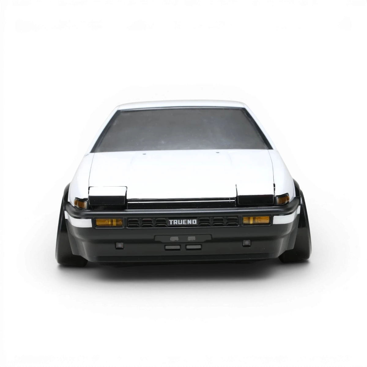 Carrosserie Toyota AE86 Trueno T3 de Team Yokomo pour voiture RC, vue de face avec détails de la carrosserie en plastique.