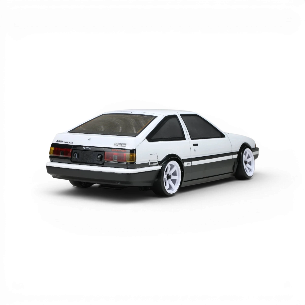Carrosserie Toyota AE86 Trueno T3 pour voiture RC, fabriquée par Team Yokomo, vue de face avec détails de la carrosserie.