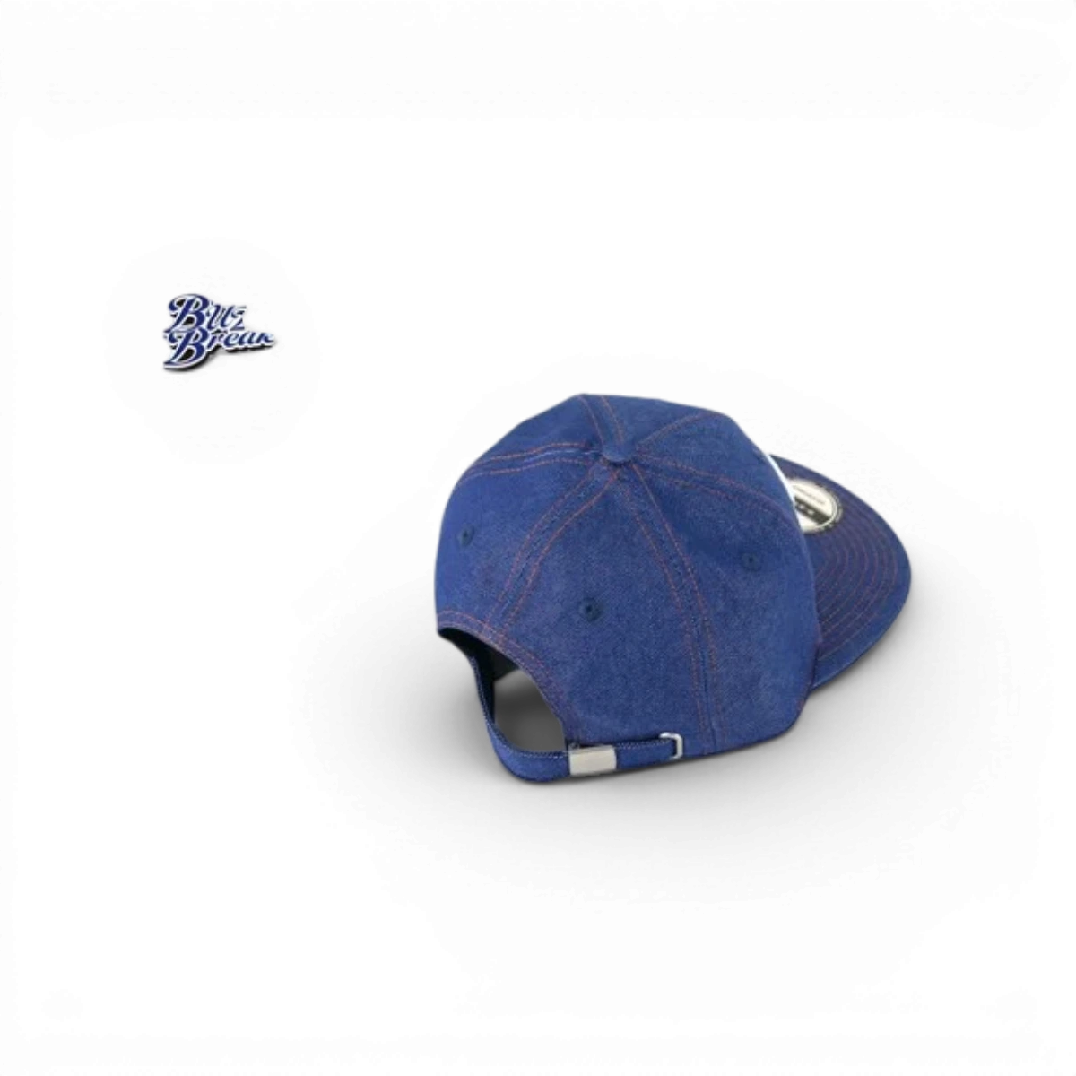 Casquette BuzzBreak × B-STYLE en denim bleu, accessoire mode, édition limitée, vue de face avec logo brodé visible.