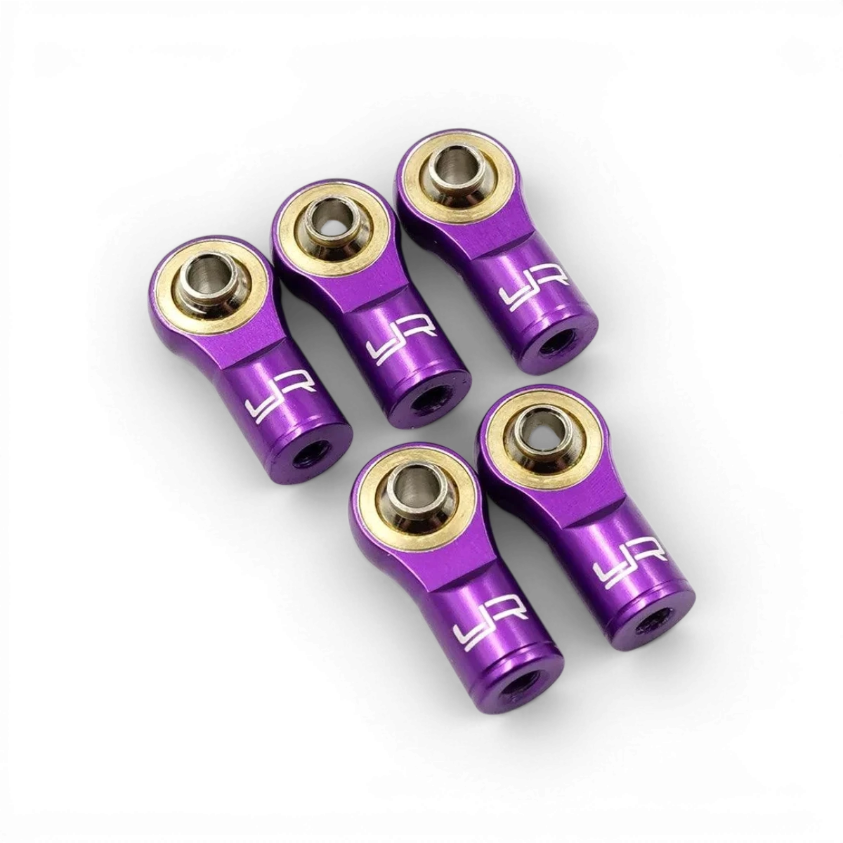 Chapes en aluminium pas inversé violettes de la marque Yeah Racing, avec finition lisse et détails techniques visibles.