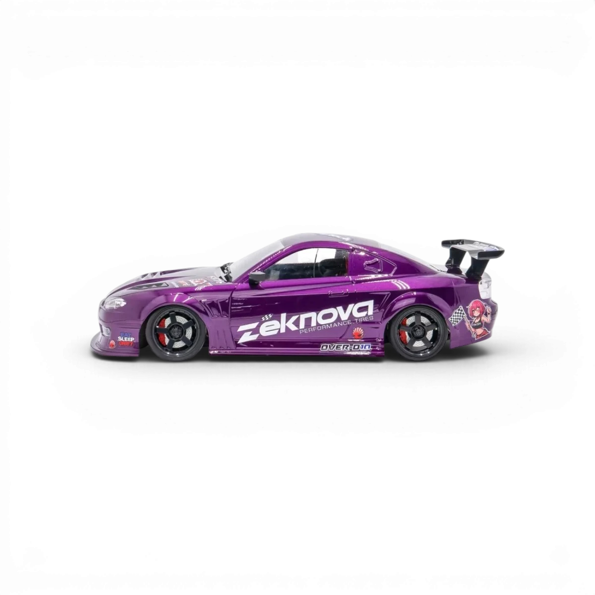 Châssis RC drift HOBBYTECH OVER-D10 RTR Brushless RWD, vue de face avec composants et pneus visibles.