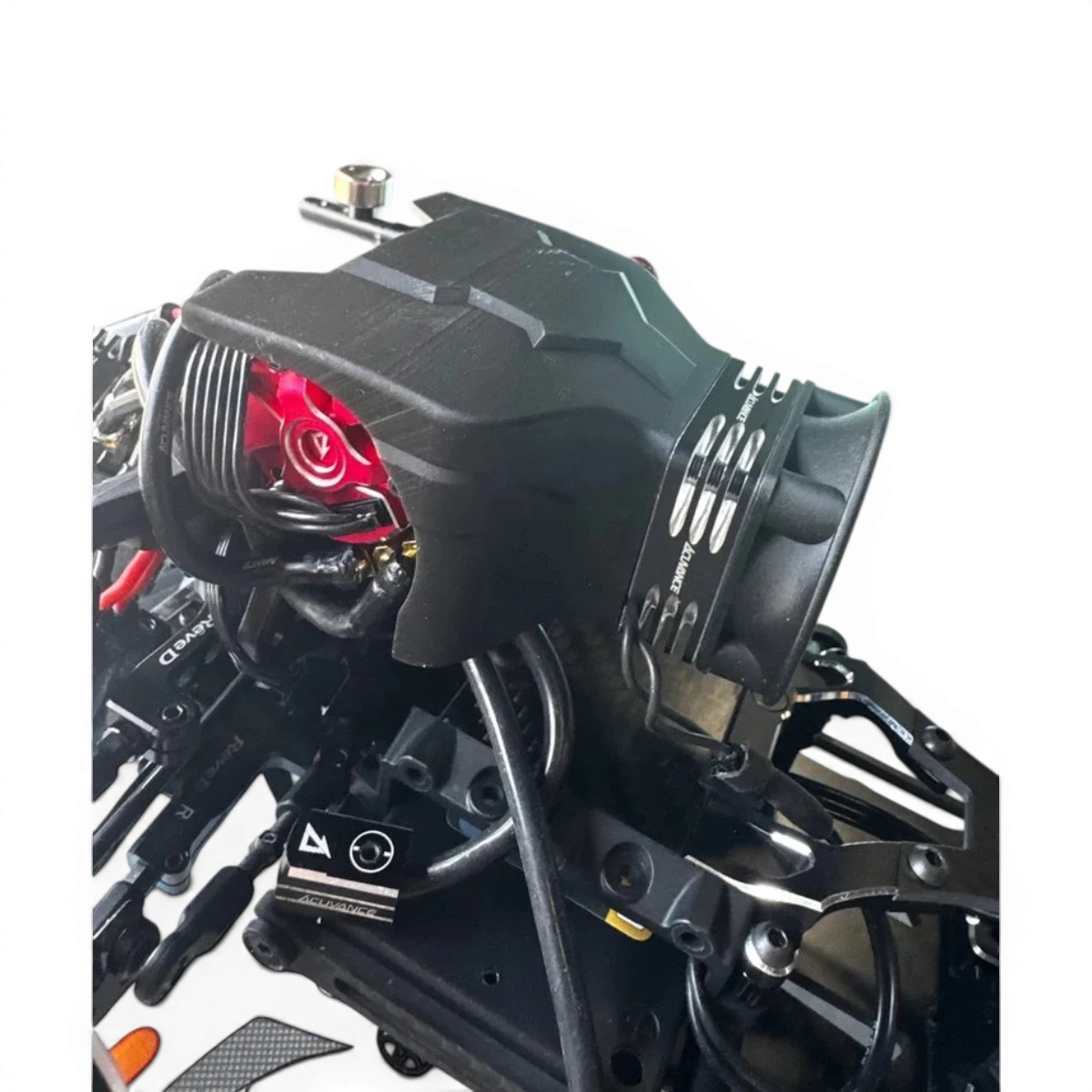 Couvercle ventilateur Boost pour RDX, pièce électronique noire de la marque Addiction RC Design, vue de face.