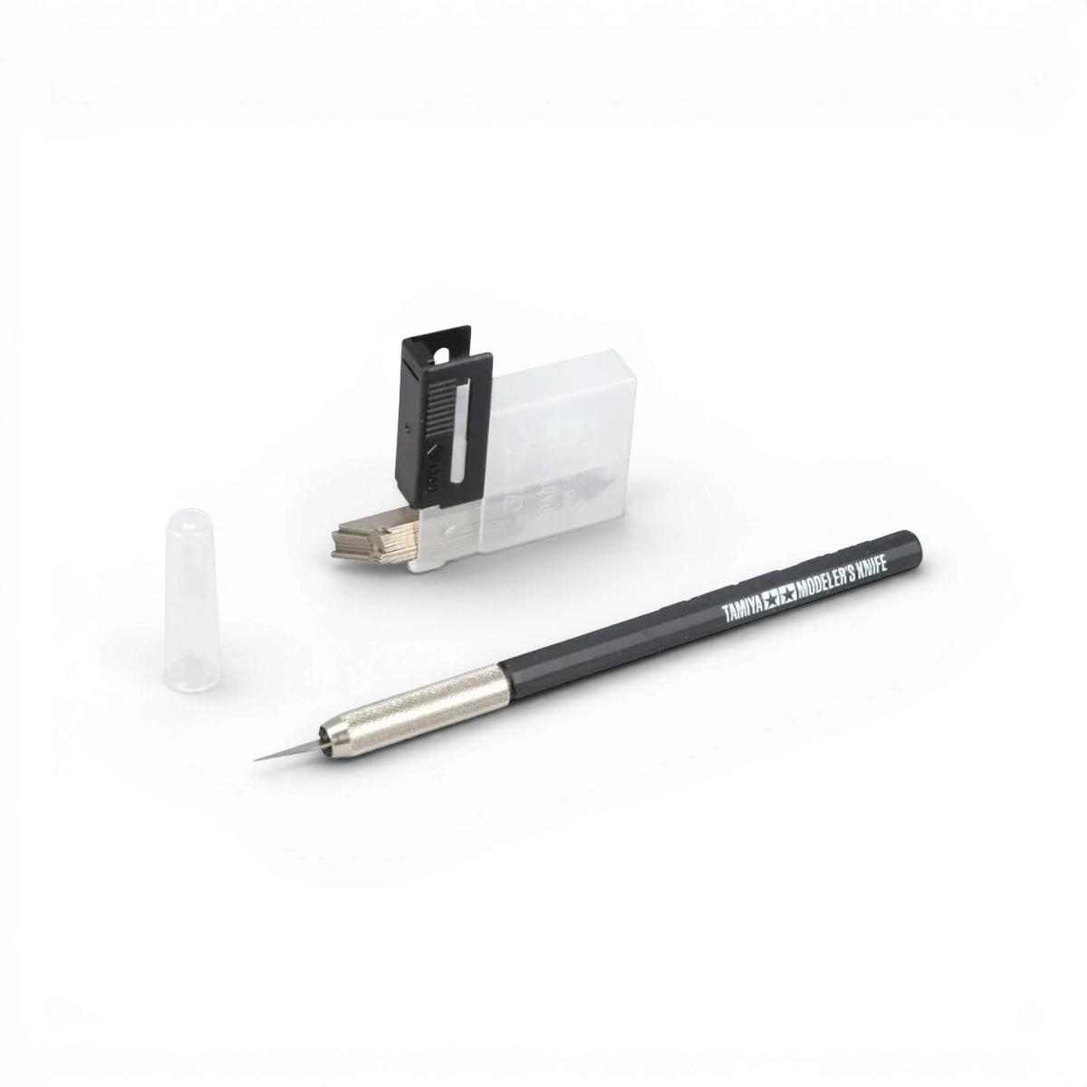 Cutter de précision noir Tamiya, accessoire de modélisme avec lame fine pour découpe précise et nette.