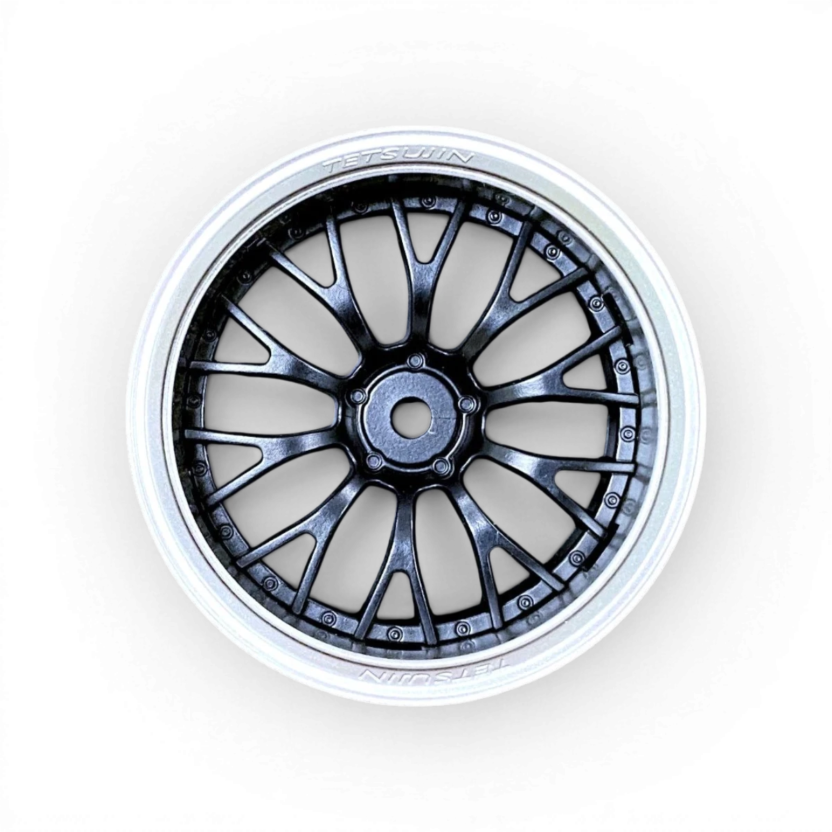 Roues Daisy gris mat et noir Tetsujin, ensemble de roues pour skateboard ou longboard, avec détails de la finition.